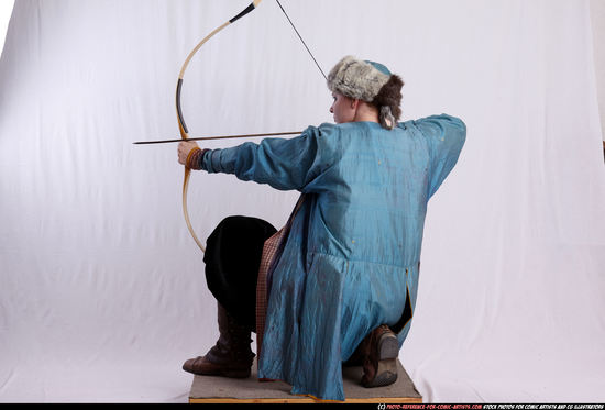 Woman Adult Average White Fighting with bow Kneeling poses Army