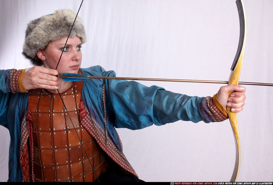 Woman Adult Average White Fighting with bow Kneeling poses Army