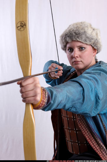 Woman Adult Average White Fighting with bow Kneeling poses Army