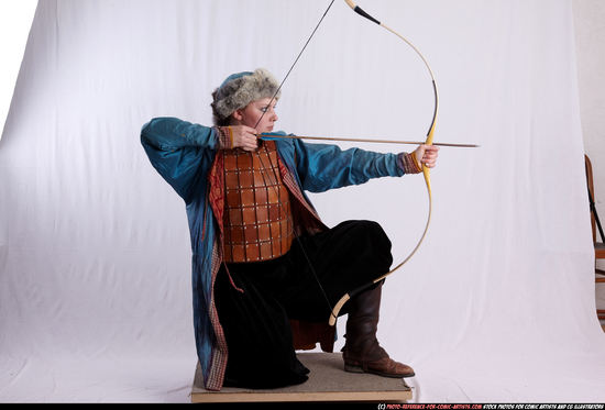 Woman Adult Average White Fighting with bow Kneeling poses Army