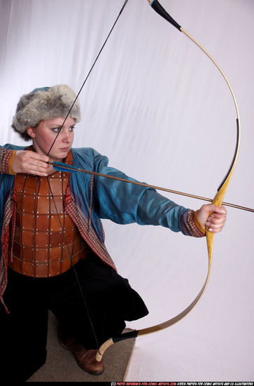 Woman Adult Average White Fighting with bow Kneeling poses Army