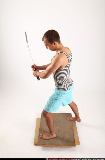 Man Adult Muscular White Fighting with sword Standing poses Sportswear