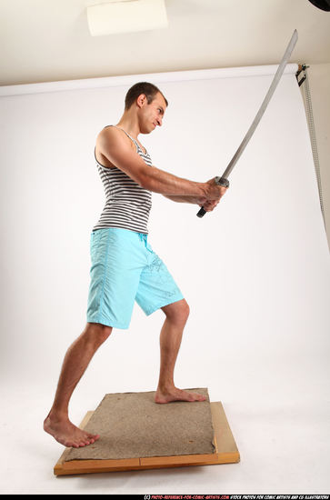 Man Adult Muscular White Fighting with sword Standing poses Sportswear