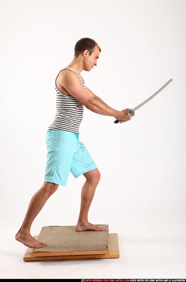 Man Adult Muscular White Fighting with sword Standing poses Sportswear