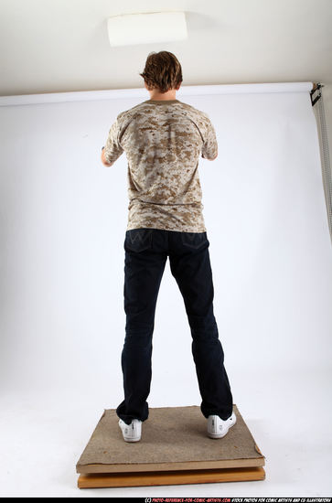 Man Adult Athletic White Fighting with gun Standing poses Casual