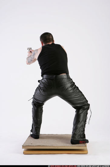 Man Adult Athletic White Fighting with gun Kneeling poses Casual