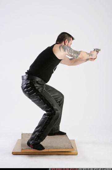 Man Adult Athletic White Fighting with gun Kneeling poses Casual