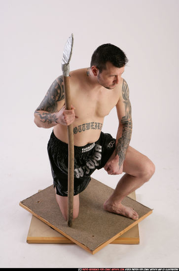 Man Adult Athletic White Fighting with spear Kneeling poses Sportswear