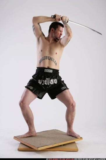 Man Adult Athletic White Fighting with sword Standing poses Sportswear