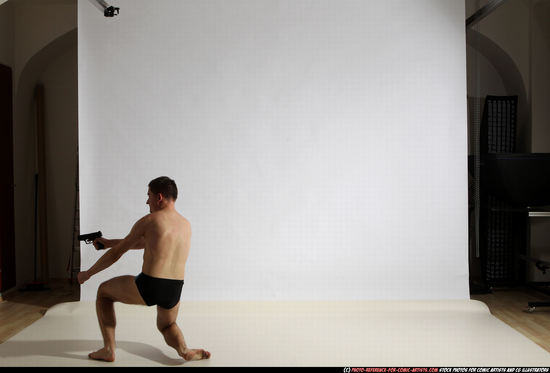 Man Adult Athletic White Fighting with gun Moving poses Underwear