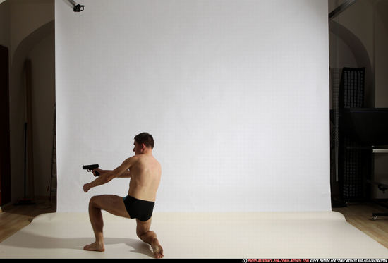 Man Adult Athletic White Fighting with gun Moving poses Underwear