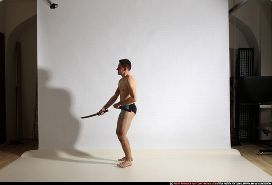 Man Adult Athletic White Fighting with sword Moving poses Underwear