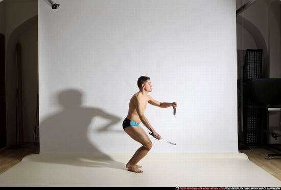 Man Adult Athletic White Fighting with sword Moving poses Underwear