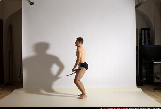 Man Adult Athletic White Fighting with sword Moving poses Underwear