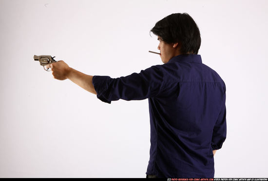 Man Adult Average Fighting with gun Standing poses Business Asian