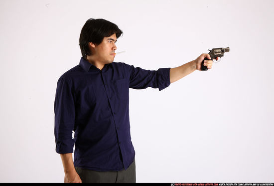 Man Adult Average Fighting with gun Standing poses Business Asian