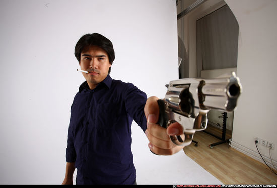 Man Adult Average Fighting with gun Standing poses Business Asian