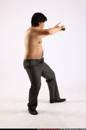 Man Adult Average Fighting with sword Fight Casual Asian