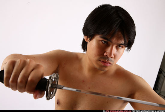 Man Adult Average Fighting with sword Fight Casual Asian