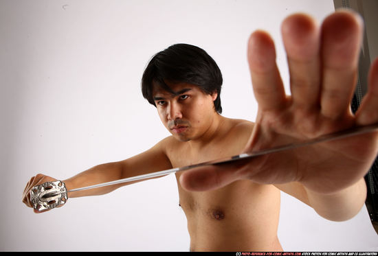 Man Adult Average Fighting with sword Fight Casual Asian