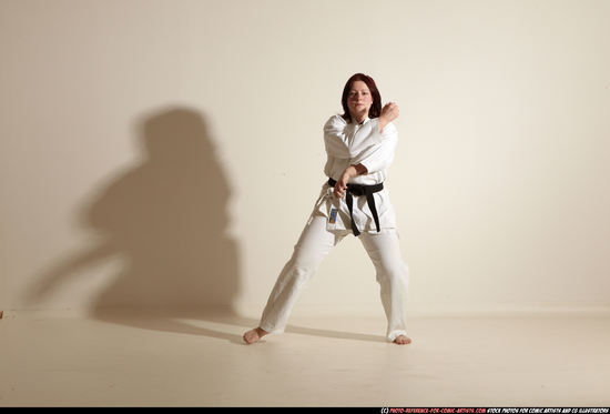 Woman Adult Average White Martial art Moving poses Sportswear