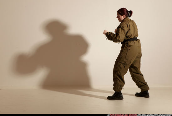 Woman Adult Average White Martial art Moving poses Army