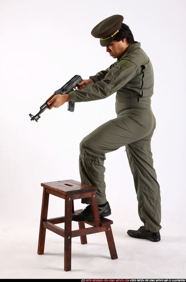 Man Adult Average Fighting with submachine gun Standing poses Army Asian