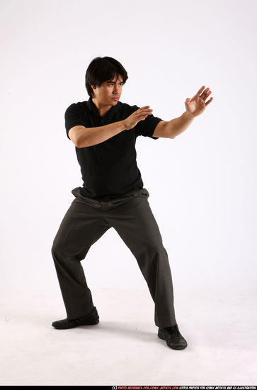 Man Adult Average Fist fight Standing poses Casual Asian