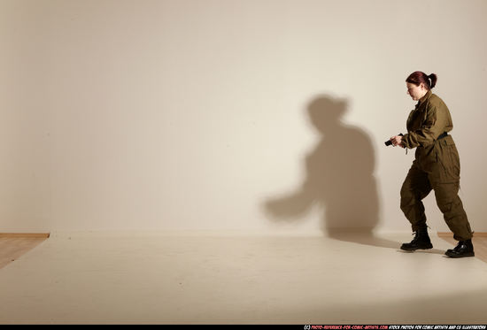 Woman Adult Average White Fighting with gun Moving poses Army