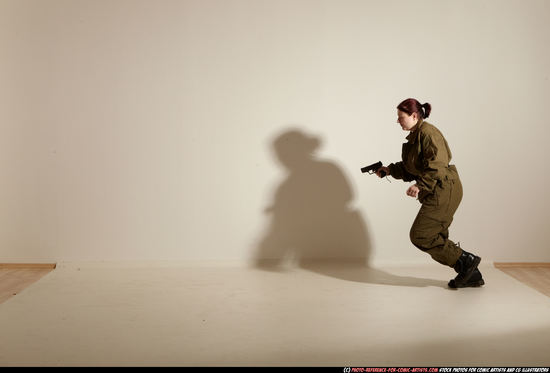 Woman Adult Average White Fighting with gun Moving poses Army