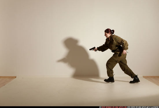 Woman Adult Average White Fighting with gun Moving poses Army