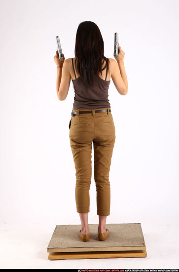 Woman Young Athletic Fighting with gun Standing poses Casual Asian