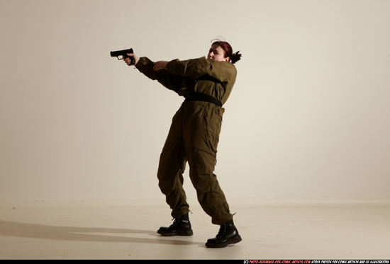 Woman Adult Average White Fighting with gun Moving poses Army