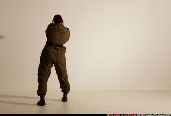 Woman Adult Average White Fighting with gun Moving poses Army