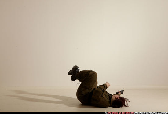 Woman Adult Average White Fighting with gun Moving poses Army