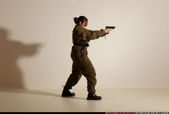 Woman Adult Average White Fighting with gun Moving poses Army