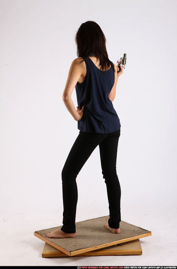 Woman Young Athletic Fighting with gun Standing poses Casual Asian