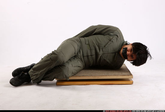 Man Adult Average Neutral Laying poses Army Asian