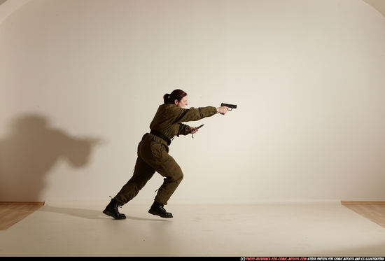 Woman Adult Average White Fighting with gun Moving poses Army