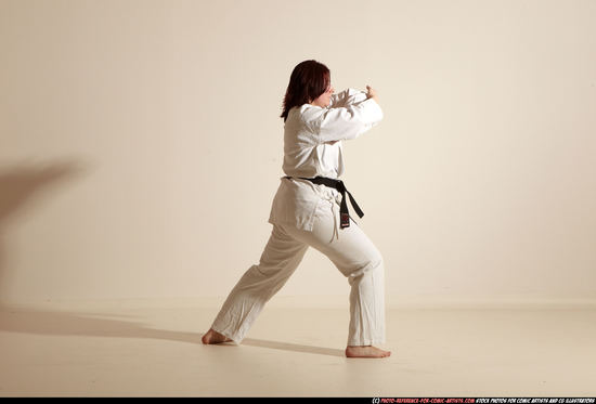 Woman Adult Average White Martial art Moving poses Sportswear