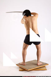 Man Adult Average Fighting with sword Standing poses Underwear Asian