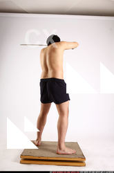Man Adult Average Fighting with sword Standing poses Underwear Asian