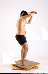 Man Adult Average Fighting with sword Standing poses Underwear Asian