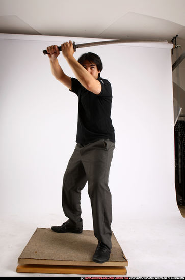 Man Adult Average Fighting with sword Standing poses Casual Asian