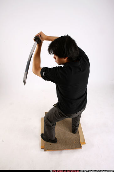 Man Adult Average Fighting with sword Standing poses Casual Asian