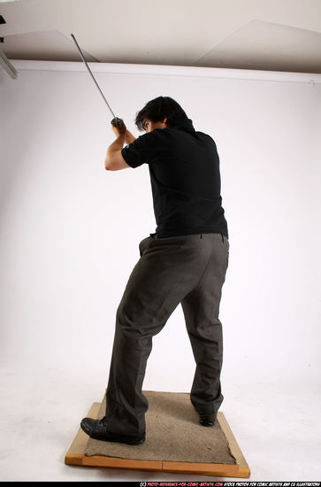 Man Adult Average Fighting with sword Standing poses Casual Asian