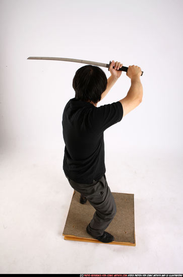 Man Adult Average Fighting with sword Standing poses Casual Asian