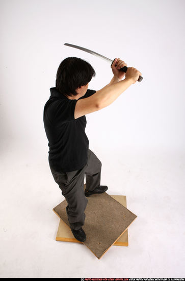 Man Adult Average Fighting with sword Standing poses Casual Asian