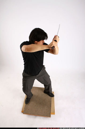 Man Adult Average Fighting with sword Standing poses Casual Asian