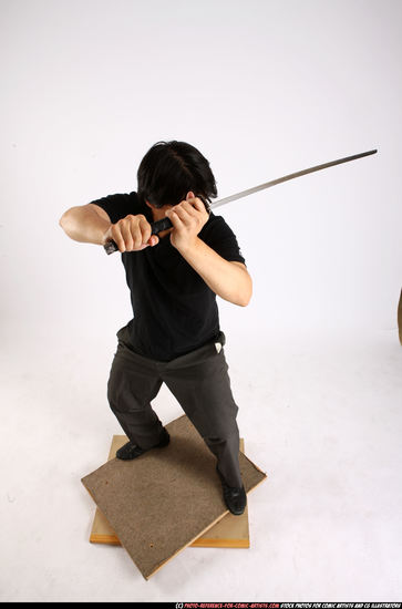 Man Adult Average Fighting with sword Standing poses Casual Asian